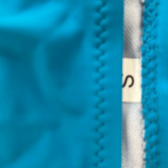 Brand new never worn side tie bikini. Bright turquoise with neon green trim. - Picture 4 of 5